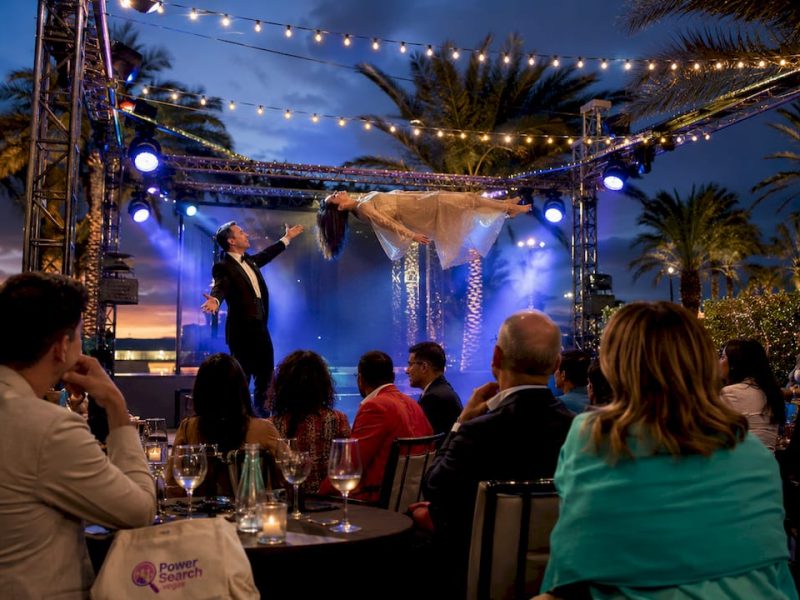 Audience watching Las Vegas magic show on stage