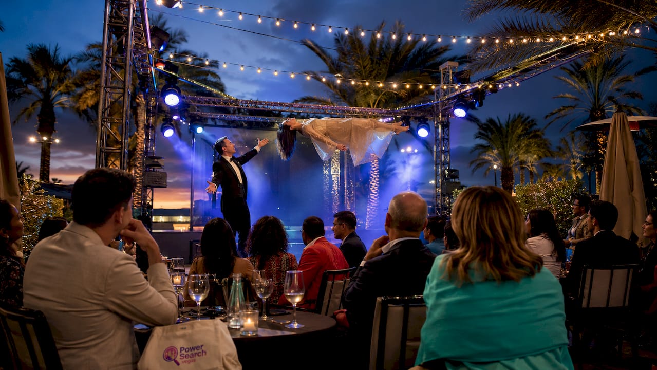 Audience watching Las Vegas magic show on stage
